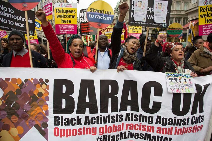 PICTURED: Black Activists Rising Against Cuts (BARAC UK) demonstrate in London (Picture via Getty Images)